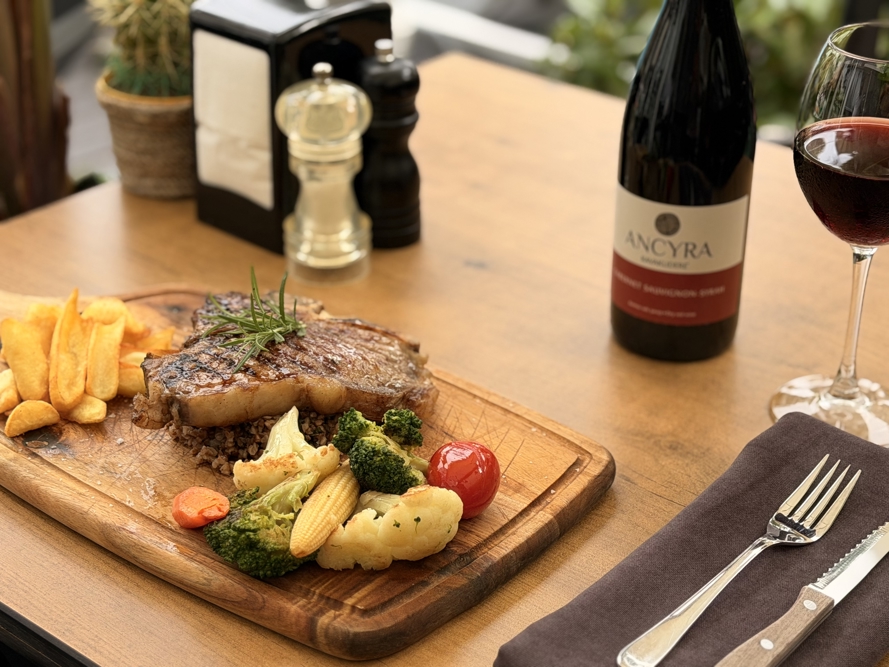 T-Bone Steak HMA Hotel & Suites